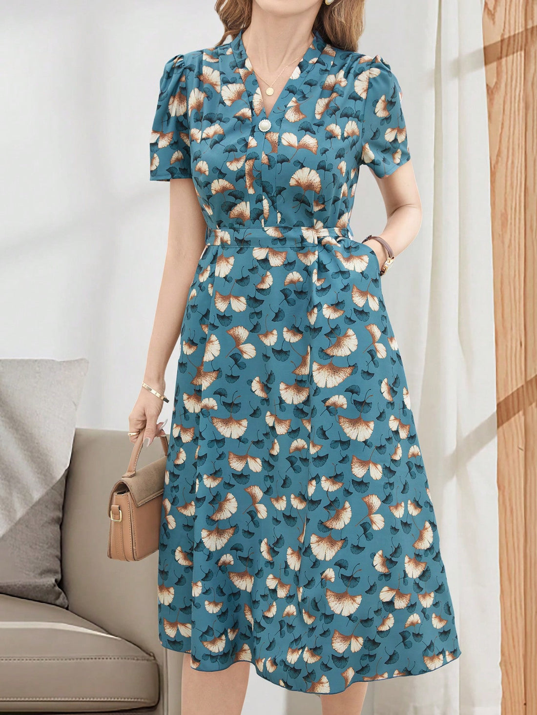 Elevate your style with Emery Rose's Elegant V-Neck Tie-Up Casual Mid-Length Dress. The chic v-neckline and playful tie-up detail will have you turning heads wherever you go. Perfect for any occasion, this dress offers both style and comfort. Be the envy of every room you enter!