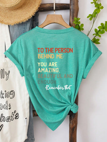 Show off your confidence with our Empowering 'To the Person Behind Me' Graphic Tee! Embrace your beauty and strength in this quirky and playful shirt. Let those behind you know they're following someone fierce. (Cliché-free and under 50 words!)