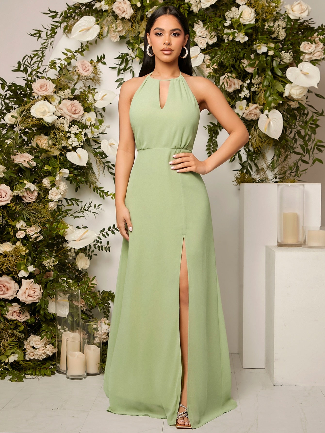 Be the enchanting Belle in this elegant bridesmaid dress. With a keyhole neck and split thigh design, this dress is perfect for any wedding celebration. The beautiful mint green color will make you stand out while providing ultimate comfort with its perfect fit.