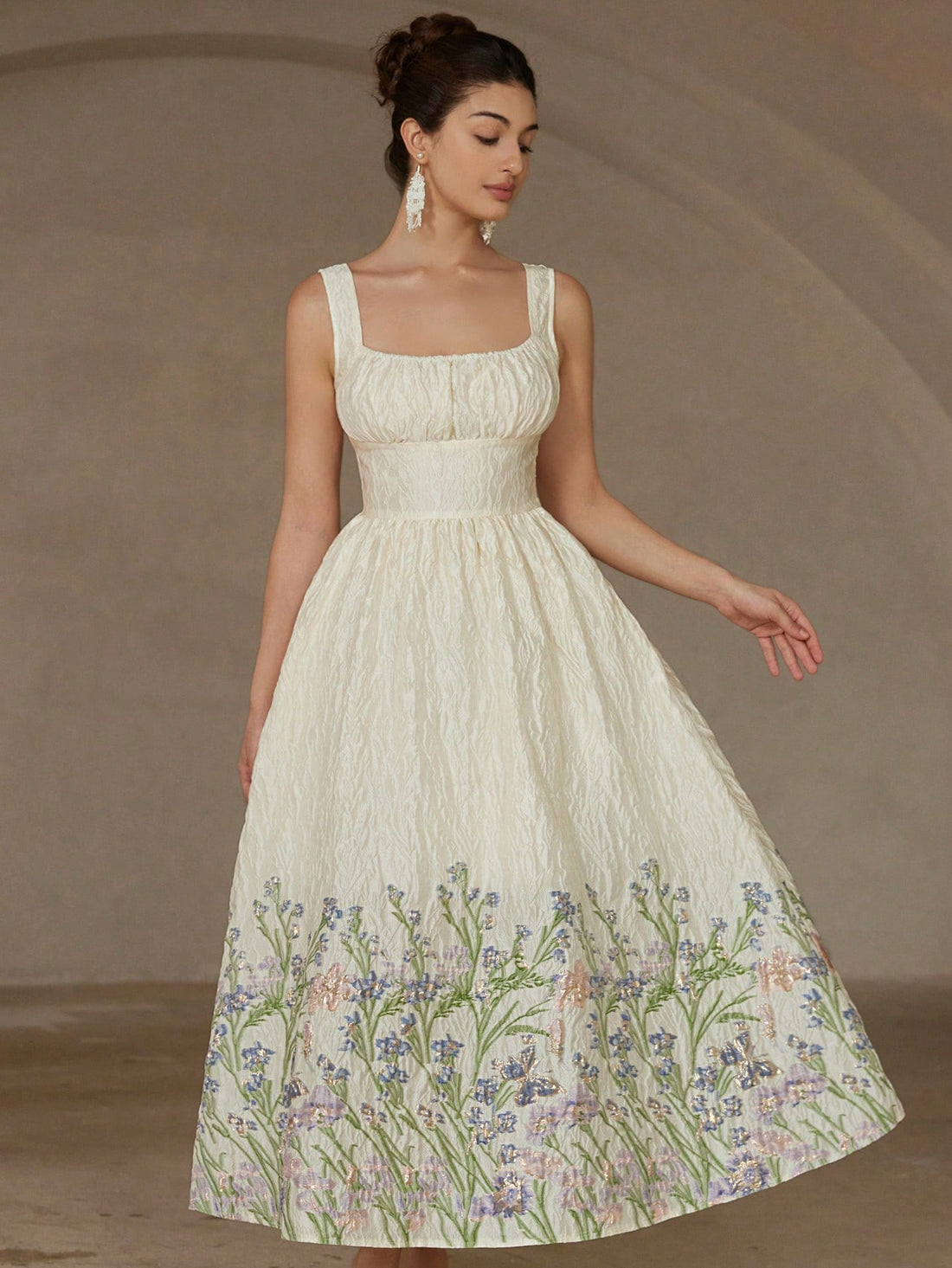 Step into sunshine with this enchanting sleeveless maxi dress, adorned with delicate floral and butterfly embroidery that dances with every breeze. Perfect for spring and summer days, it brings a touch of whimsy and lightness to your wardrobe, letting you float through warm afternoons in effortless style. Whether you're chasing butterflies or making memories, this dress is your playful companion for joyful moments.