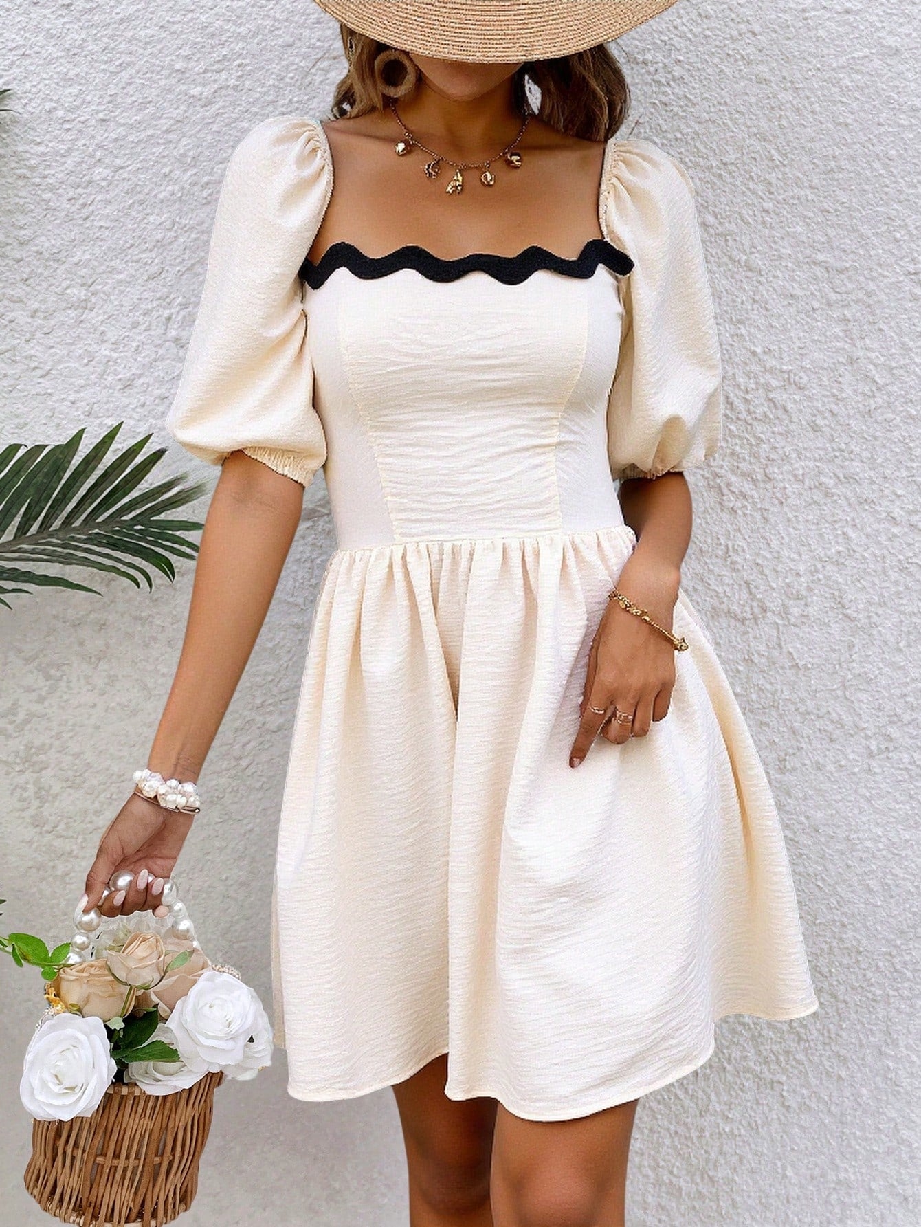 Elevate your summer wardrobe with our Enchanting Frenchy Women's Elegant Puff Sleeve Sundress. The back tie and wavy trim add a touch of whimsy, while the puff sleeves add an elegant touch. Perfect for any occasion, this dress will make you feel stylish and confident.