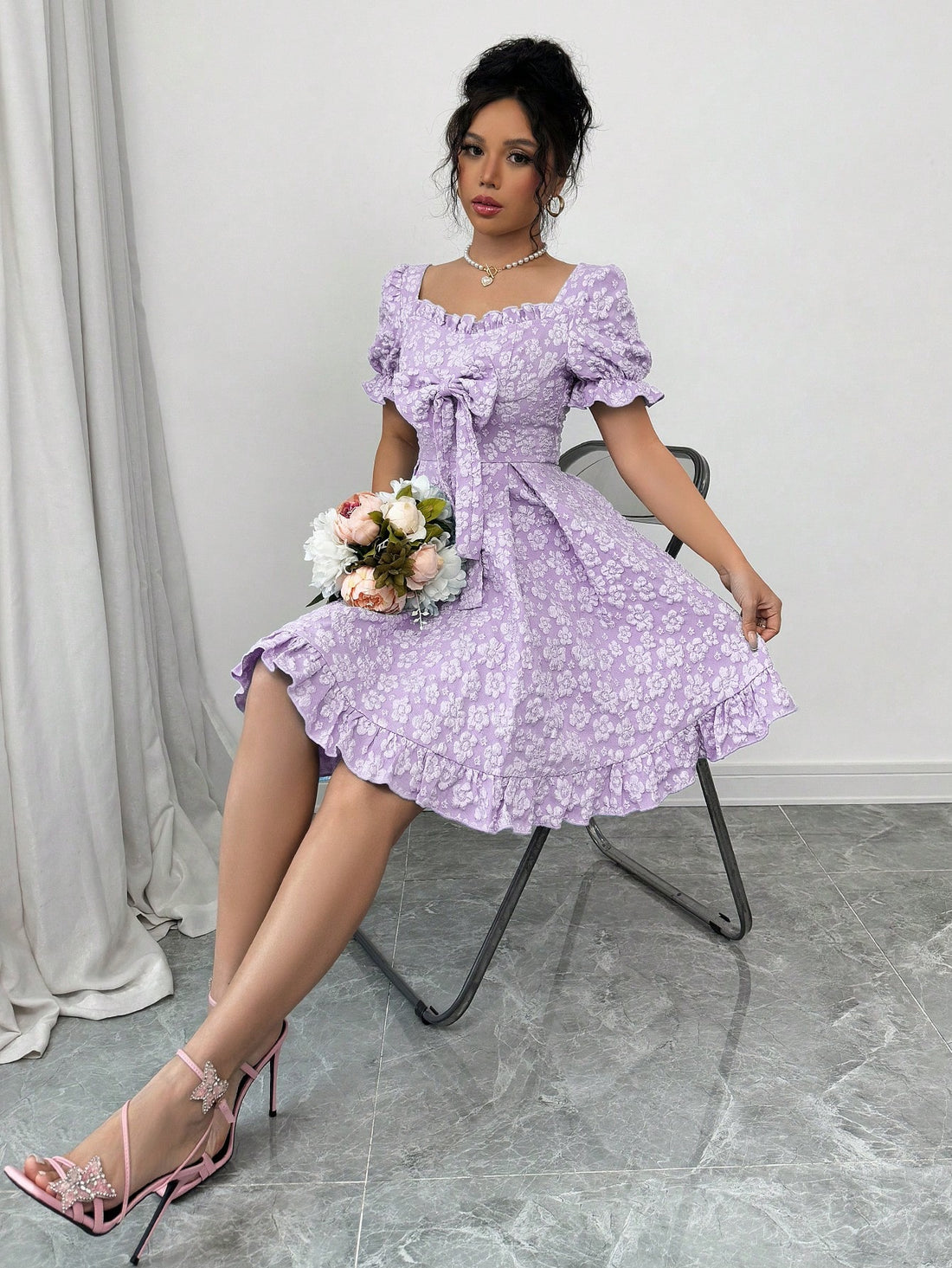 Get ready to charm everyone with our Enchanting Lavender A-Line Dress. Featuring delicate ruffled lantern sleeves and a charming bow detail, this dress is perfect for tea parties and romantic dates. Feminine and flirty, it will surely make you stand out in a crowd.