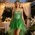 Front view of emerald green sequin fairy dress with layered high-low tulle skirt and floral wreath