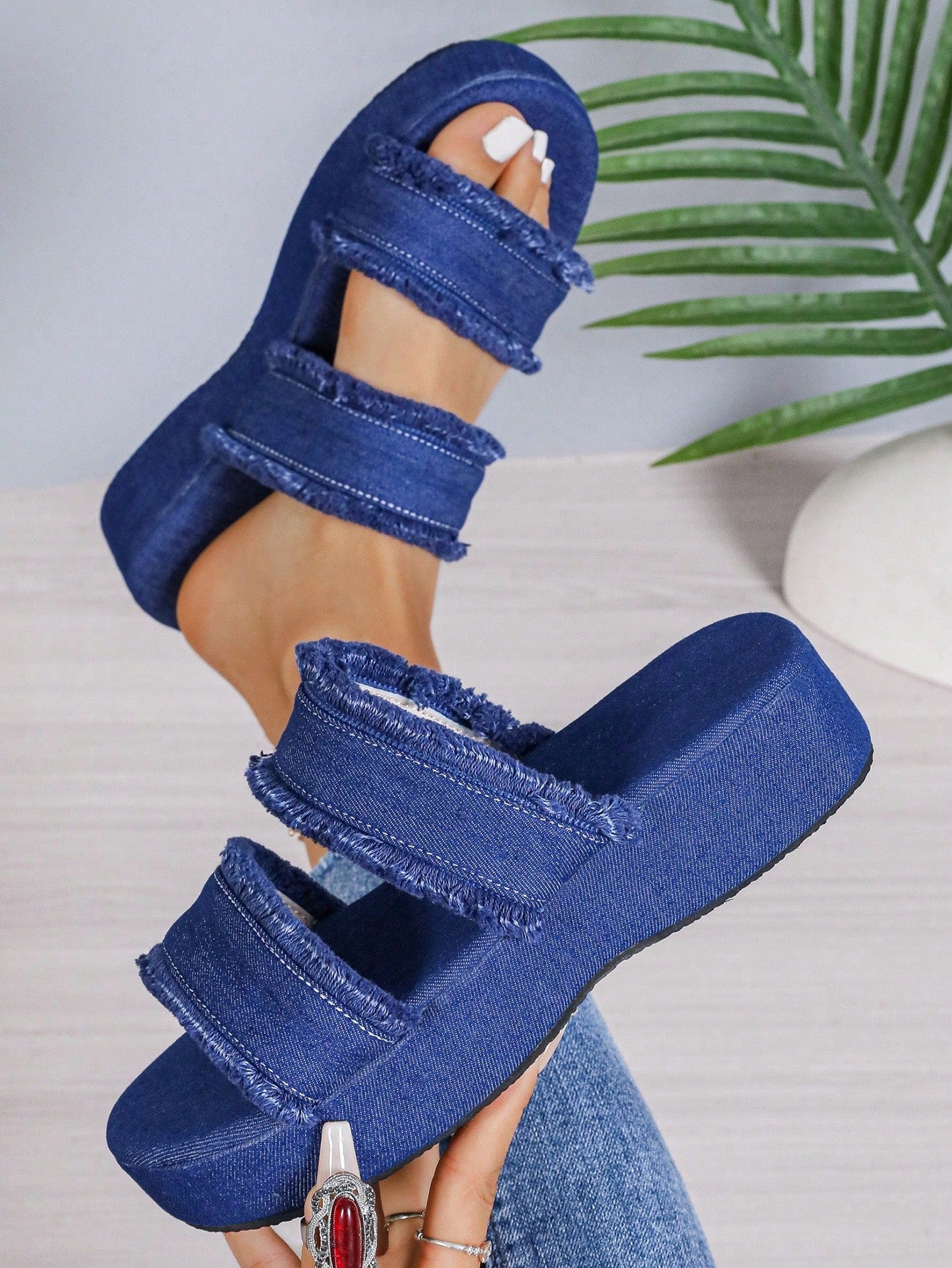 Experience style and comfort with our European Chic Wedge Heel Sandals. These fashionable sandals offer a comfortable wedge heel, perfect for all-day wear. Elevate your outfit with a touch of European charm.
