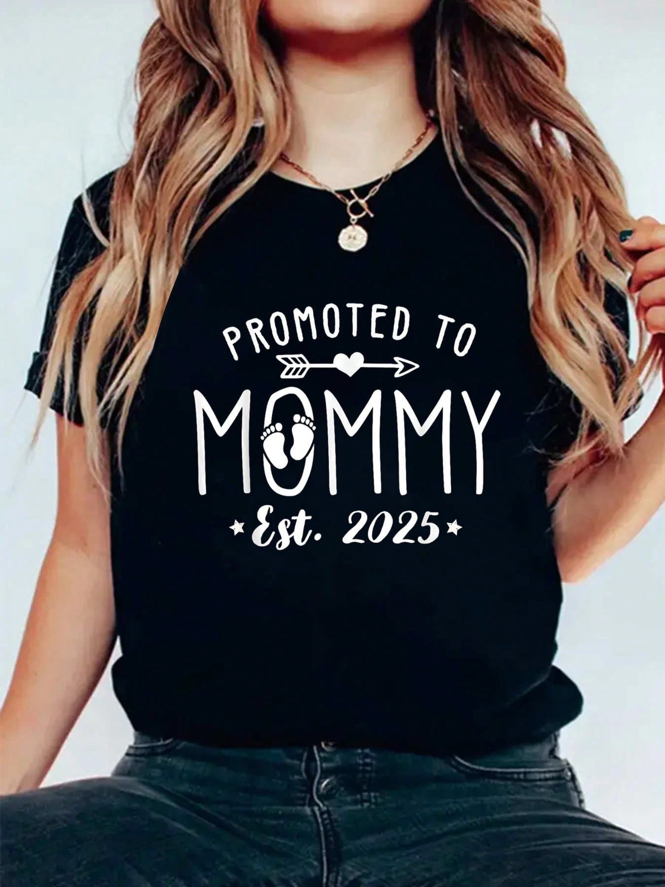 Celebrate your impending promotion with this stylish graphic tee for expecting moms! Show off your excitement and sense of humor with the catchy slogan "Promoted to Mommy 2025". Perfect for maternity photoshoots, baby showers, or just a fun way to share the news with friends and family. Congrats, Mommy-to-be!