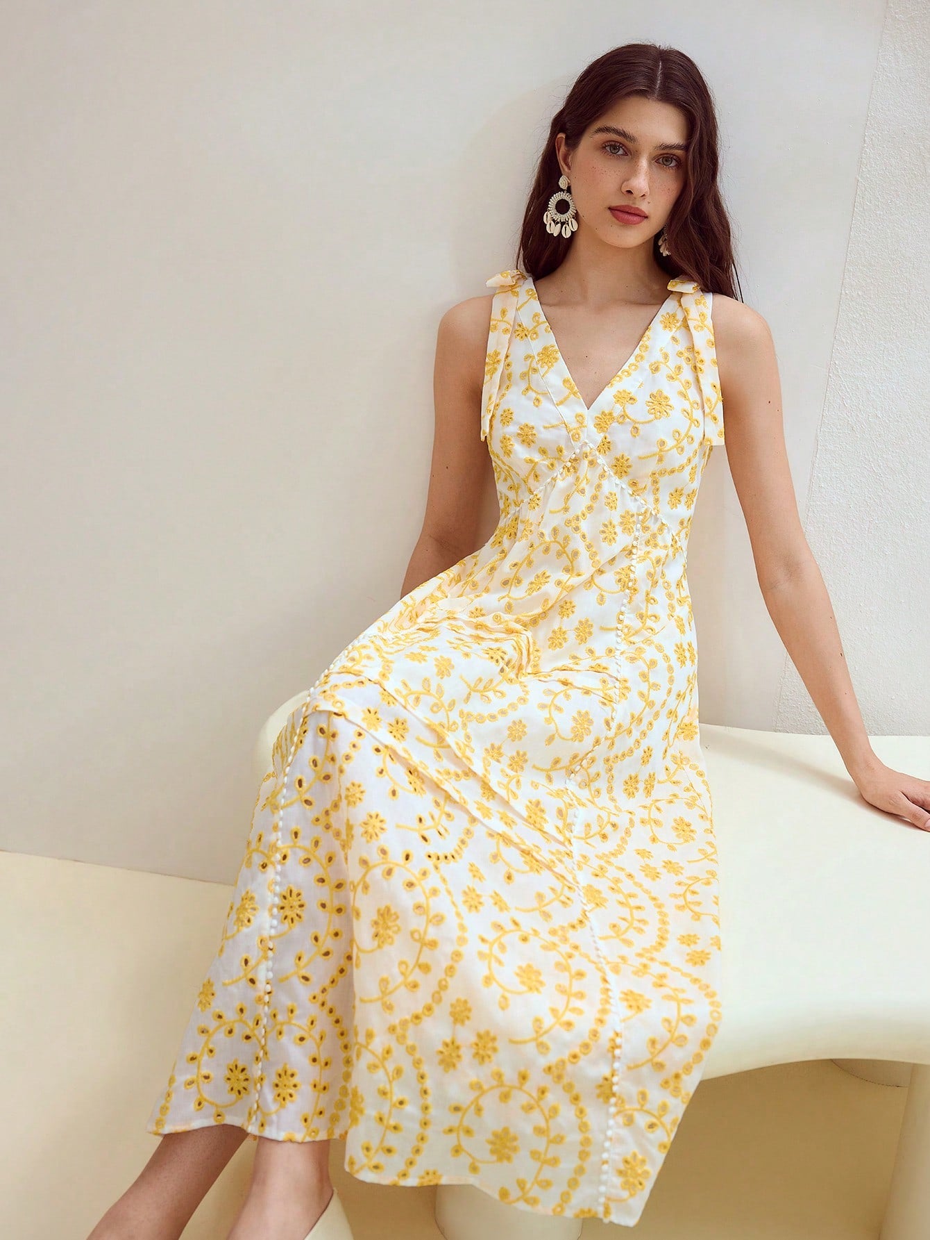 Step out in style with this Eyelet Embroidery Bow Decor Dress, designed to add a playful touch to your wardrobe. Featuring delicate eyelet embroidery and a charming bow detail, this dress blends elegance with a fun, flirty vibe. Perfect for sunny days or casual outings, it’s a delightful way to showcase your unique fashion sense while staying comfortable and chic.