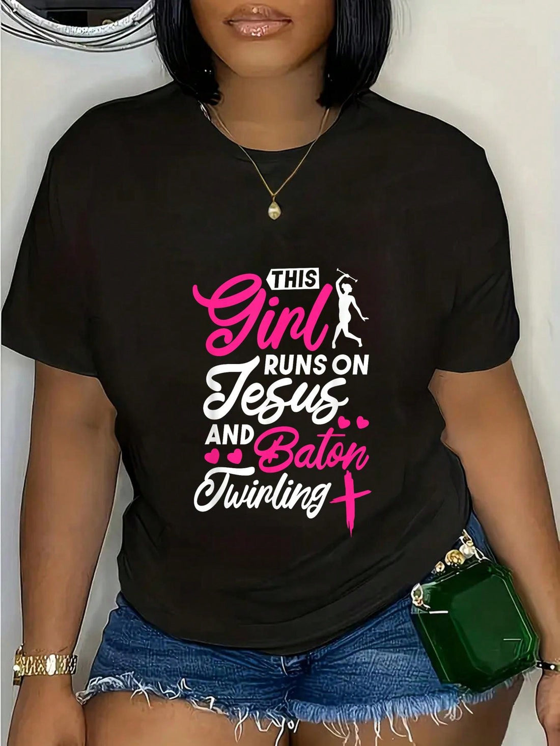 Spread faith and fun with this 'This Girl Runs On Jesus and Baton Twirling' graphic tee! Perfect for believers (and baton twirlers) who don't take themselves too seriously. A quirky and playful addition to any wardrobe!