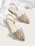 Elevate your fall and winter wardrobe with these sophisticated slingback flats. Featuring delicate faux pearl embellishments and a refined point toe silhouette, these flats blend timeless elegance with modern comfort. The slingback design provides secure support while maintaining a sleek, polished look perfect for both casual outings and dressier occasions. 
