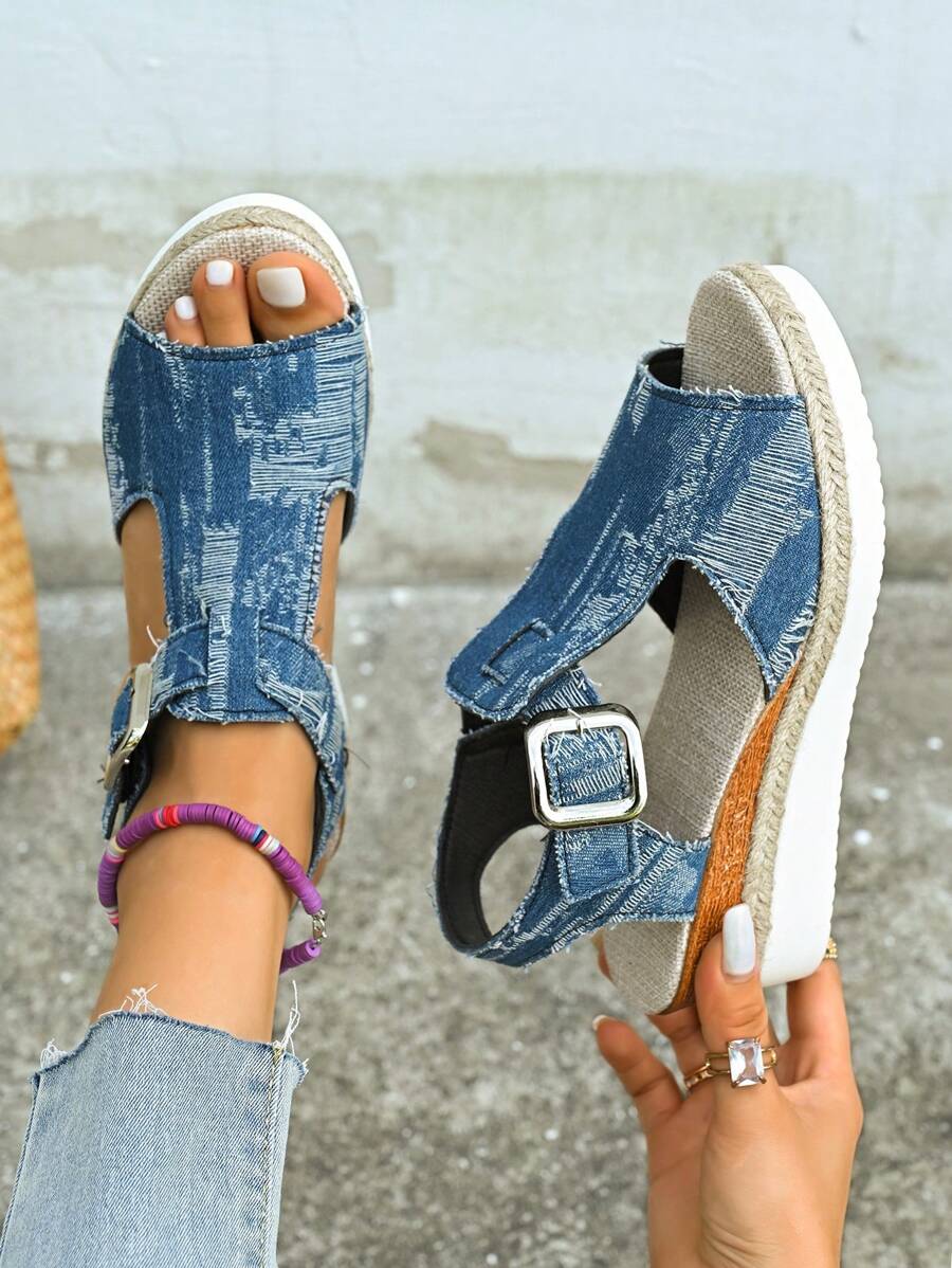 Step into summer fun with these playful black wedge sandals, featuring charming hemp rope accents that add a touch of natural flair. Perfect for daily wear or your next adventure, their comfortable wedge heel keeps you stylish and steady all day long. Embrace sunny days with a sandal that’s as lively and versatile as you are!