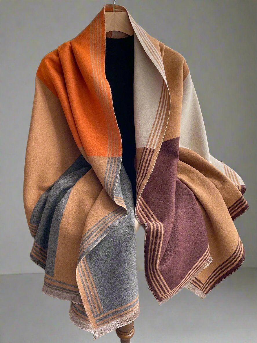Stay warm and stylish this winter with our fashionable faux cashmere patchwork shawl. Made with premium materials, this shawl provides both warmth and fashion. Perfect for any winter outing, it is a must-have for any wardrobe. Say goodbye to bulky and boring winter wear with our stylish shawl.