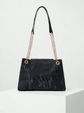Meet your new favorite sidekick: a sleek black chain bucket bag that flips between chic underarm and casual carry styles. Ideal for busy college days or pro meetings, its minimalist design keeps your essentials close without the bulk. Lightweight yet sturdy, this bag adds a hint of edge to any outfit—because who says practical can’t be fun?