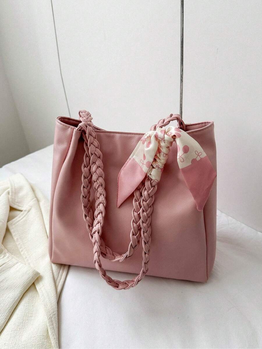 Elevate your everyday carry with this chic minimalist tote. Crafted from durable polyester, this small shoulder bag features a clean solid pink design accented with a versatile scarf detail for effortless style. The double handles and secure zipper closure make it perfect for commuting, shopping, or casual outings. Braid detailing adds subtle sophistication to this practical, fashion-forward accessory.