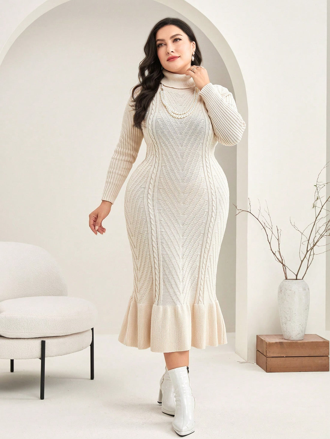 Step into cozy chic with this plus-size sweater dress featuring a high neck and playful ruffle details. Perfect for adding a touch of elegance without sacrificing comfort, it’s your go-to for effortless style that hugs your curves in all the right places. Whether you're dressing up or down, this dress makes feeling fabulous a breeze!