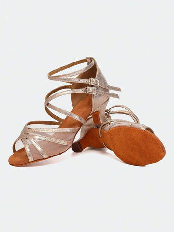 Step into elegance with these stunning silver ankle strap Latin dance shoes designed for women who demand both style and performance. Featuring a secure buckle closure and glitter upper material that catches the light beautifully, these shoes are crafted for salsa, ballroom, and competitive dancing. The suedette insole and outsole provide comfort and grip, allowing you to execute precise footwork with confidence. Whether you're a seasoned dancer or perfecting your technique, these versatile shoes deliver th