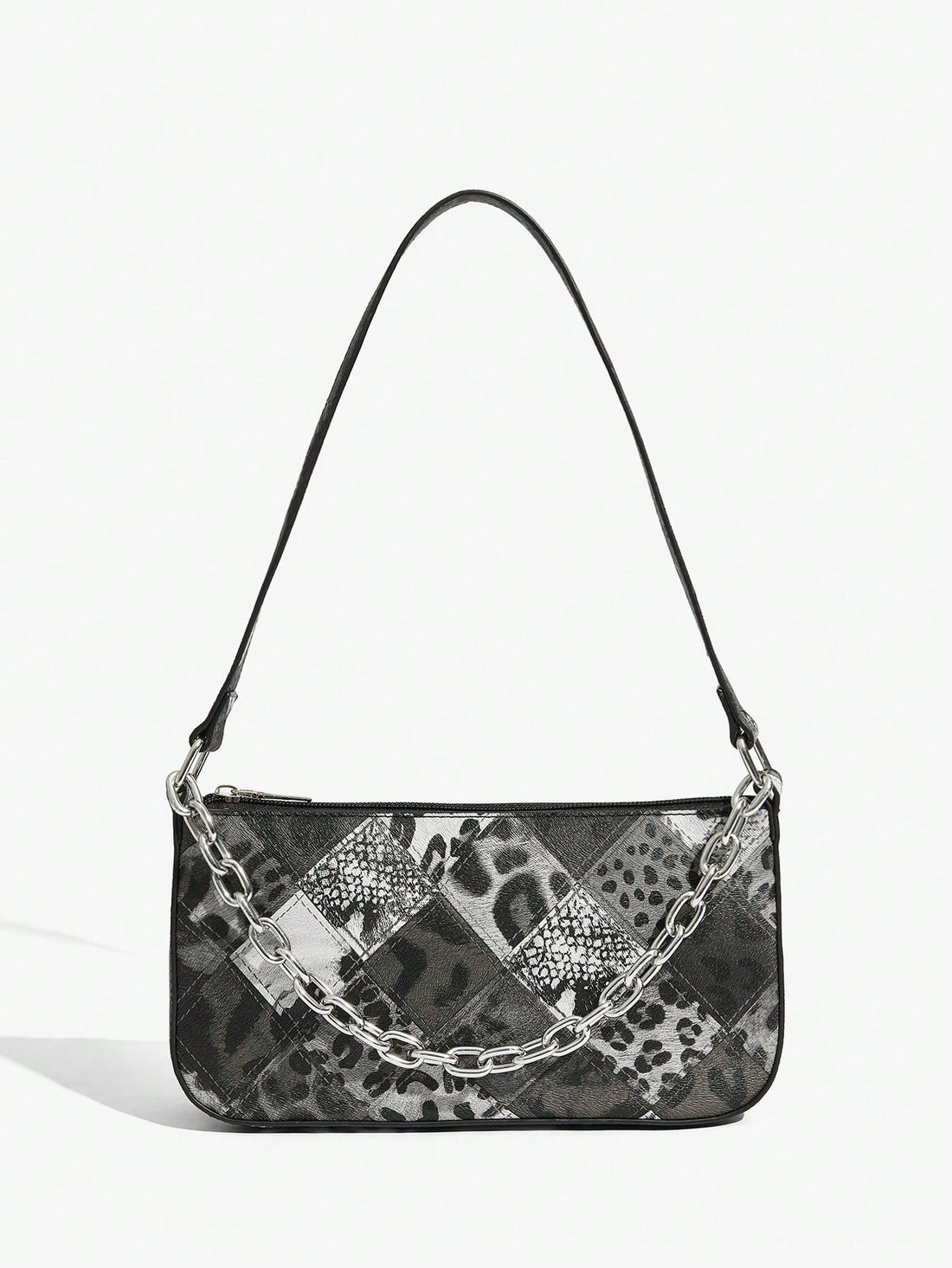 Elevate your style with this playful hobo bag featuring bold leopard and snake prints. Its versatile top handle makes it perfect for everyday adventures, effortlessly adding a wild touch to any outfit. Chic, spacious, and ready to turn heads wherever you go!