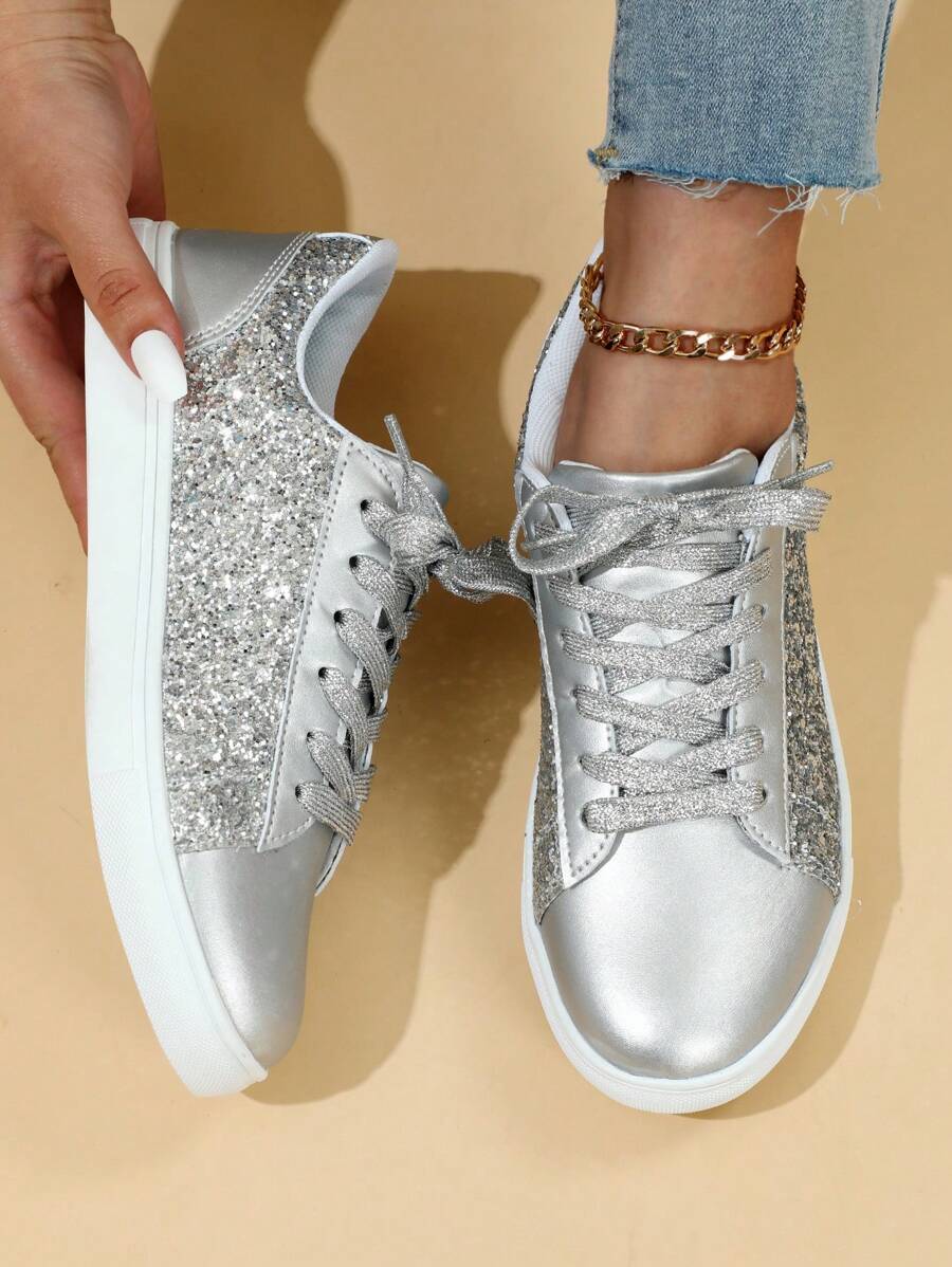Step into style with these eye-catching pink sequin sneakers designed for women who refuse to compromise on comfort or flair. The shimmering sequin upper catches the light with every step, making them perfect for casual outings, weekend adventures, or adding sparkle to festive celebrations. Built with a supportive low-top silhouette, these athletic shoes feature cushioned insoles and flexible soles that keep your feet comfortable throughout the day.