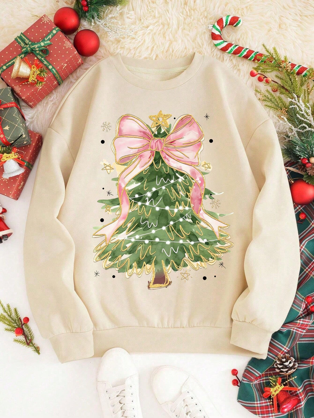 Stay cozy and stylish this holiday season with our Festive Charm sweatshirt. Designed with a beautiful Christmas tree print and adorned with a cute bow, it's the perfect addition to your casual wardrobe. Made for women who love to spread the holiday spirit, this sweatshirt will keep you warm and festive with its comfortable fit and charming design.