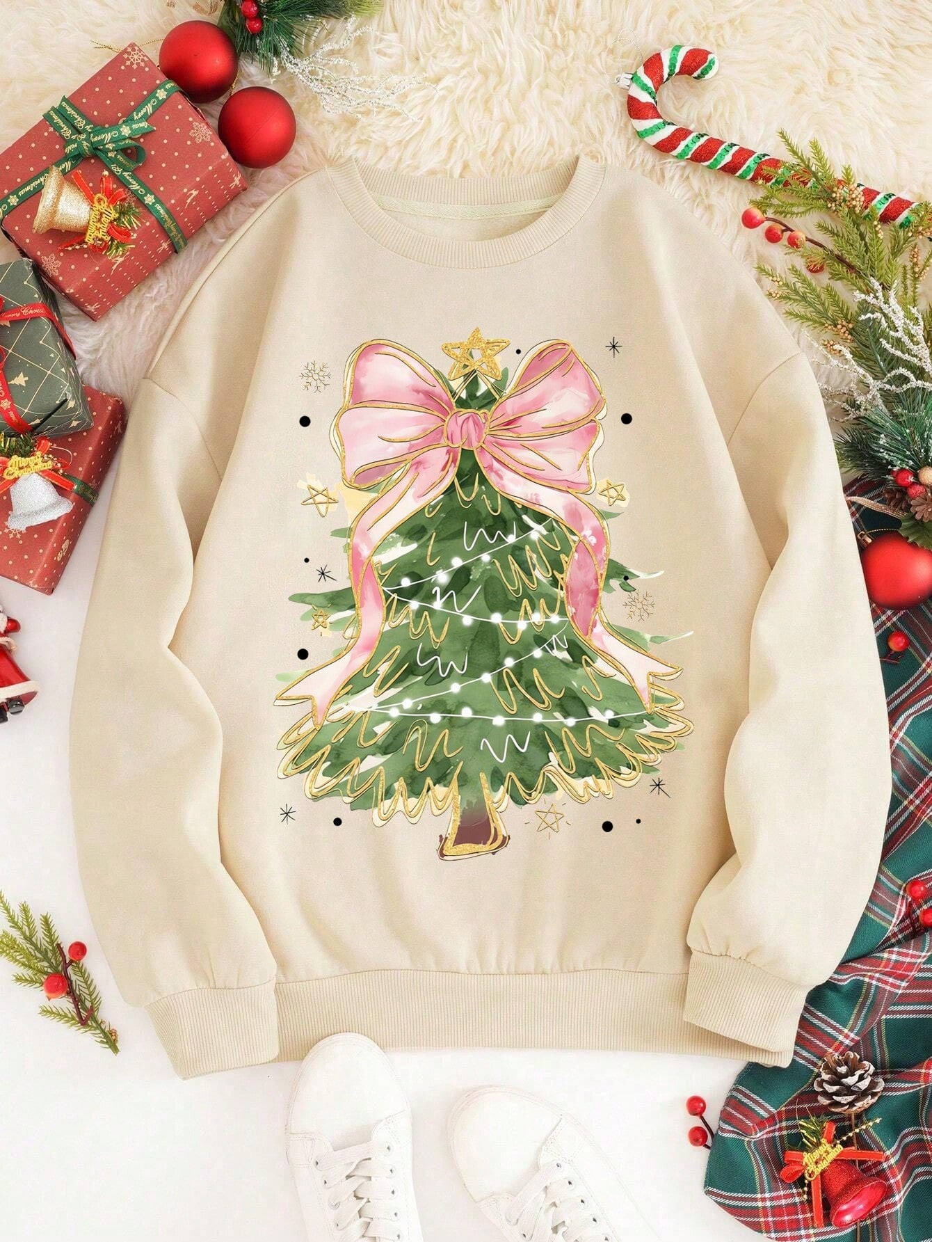 Stay cozy and stylish this holiday season with our Festive Charm sweatshirt. Designed with a beautiful Christmas tree print and adorned with a cute bow, it's the perfect addition to your casual wardrobe. Made for women who love to spread the holiday spirit, this sweatshirt will keep you warm and festive with its comfortable fit and charming design.