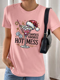 This festive Christmas wine glass graphic print tee for women is perfect for showing off your holiday spirit. Made with high-quality materials, it offers a comfortable fit and features a fun design that is sure to bring a smile to everyone's face. Get ready to spread some festive cheer with this festive tee!
