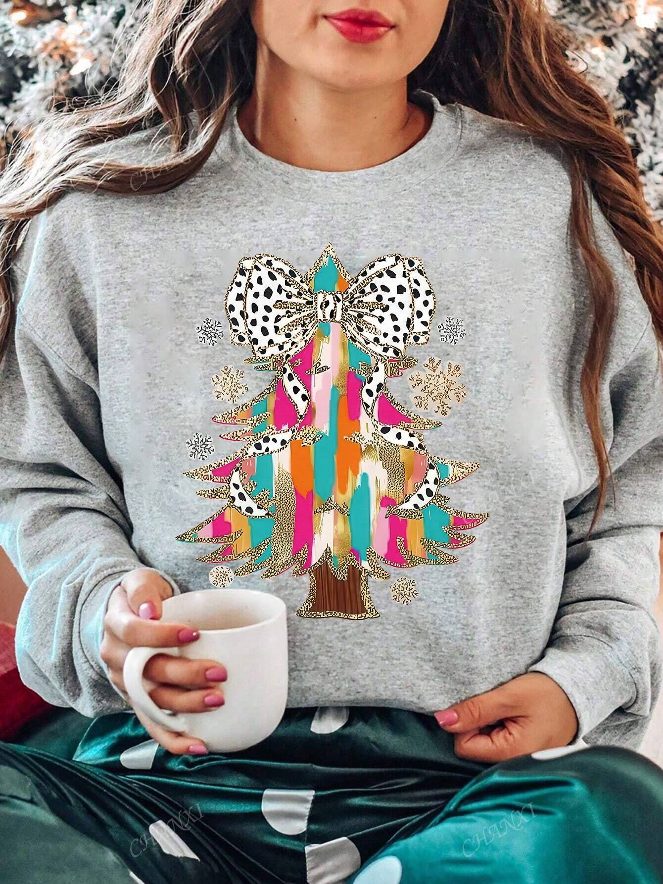 Experience the joy of the holiday season with our Festive Cheer sweatshirt. Made with cozy fleece material, this colorful sweatshirt features a cartoon bow Christmas tree design that is sure to bring a smile to your face. Stay warm and stylish this winter!
