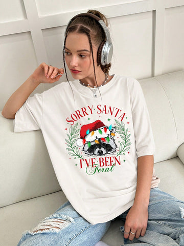Indulge in the festive spirit with our Christmas raccoon slogan graphic tee for women. With a cute and trendy design, this tee is perfect for spreading holiday cheer. Made with high-quality materials, it offers comfort and durability. Get into the Christmas spirit with this must-have addition to your wardrobe.