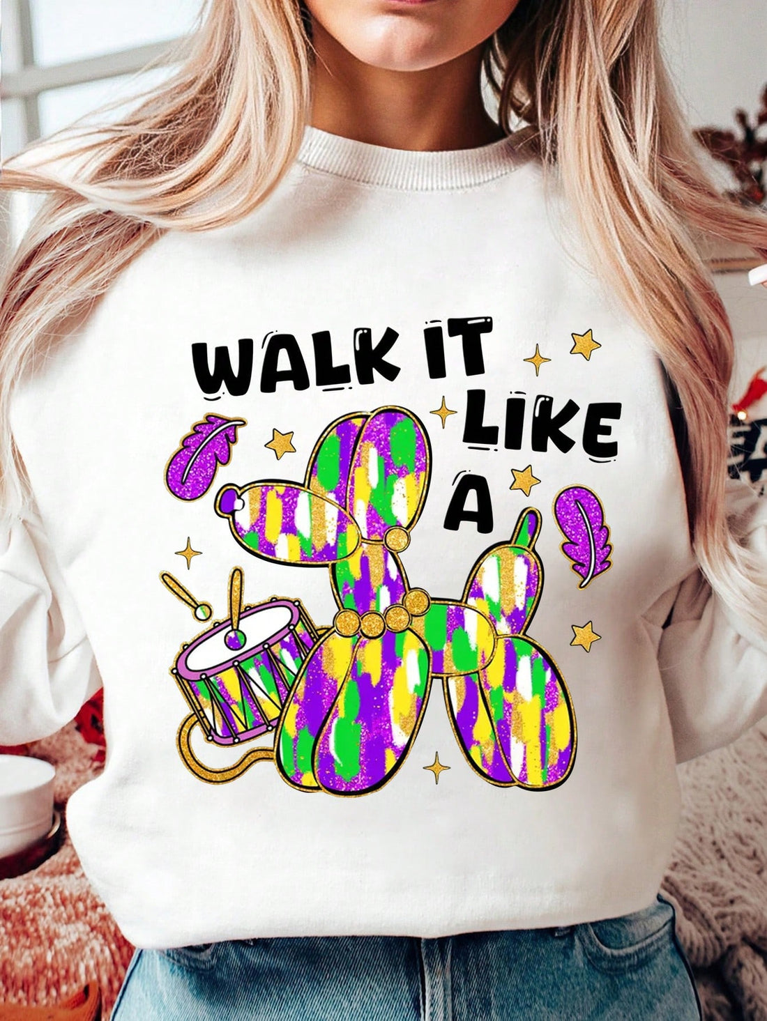 Stand out at holiday celebrations with this playful Mardi Gras sweatshirt featuring the punny phrase "Walk It Like A Dog." Show off your festive spirit and sense of humor with this quirky sweatshirt, perfect for any Mardi Gras celebration.