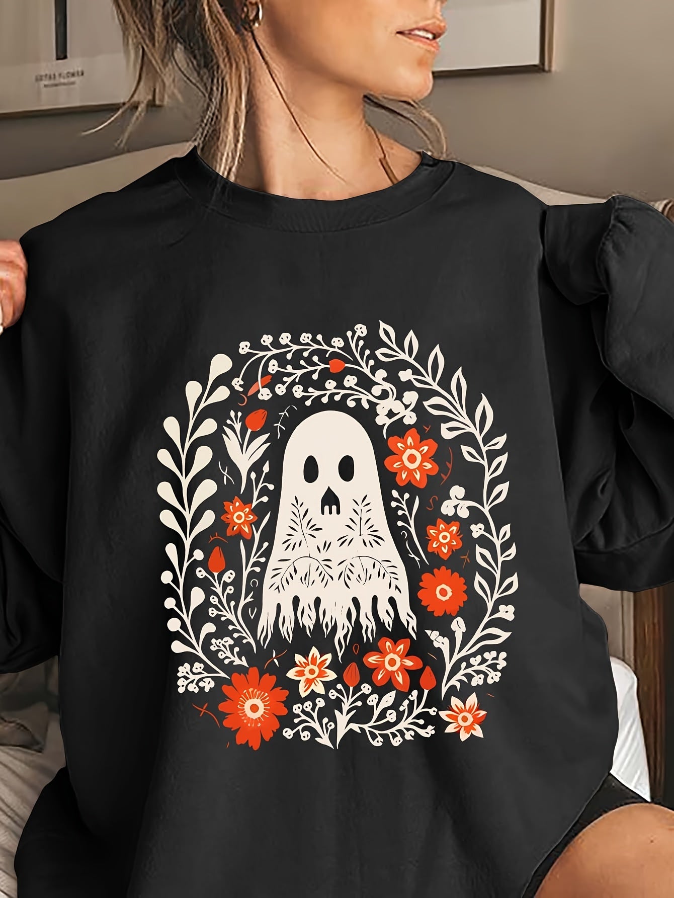 Stay cozy and stylish this fall and winter with our Festive Halloween Ghost Floral Print Sweatshirt for Women. Featuring a unique ghost floral print, this sweatshirt is perfect for the Halloween season. The cozy crew neck and casual fit make it a comfortable and fashionable choice for any occasion.