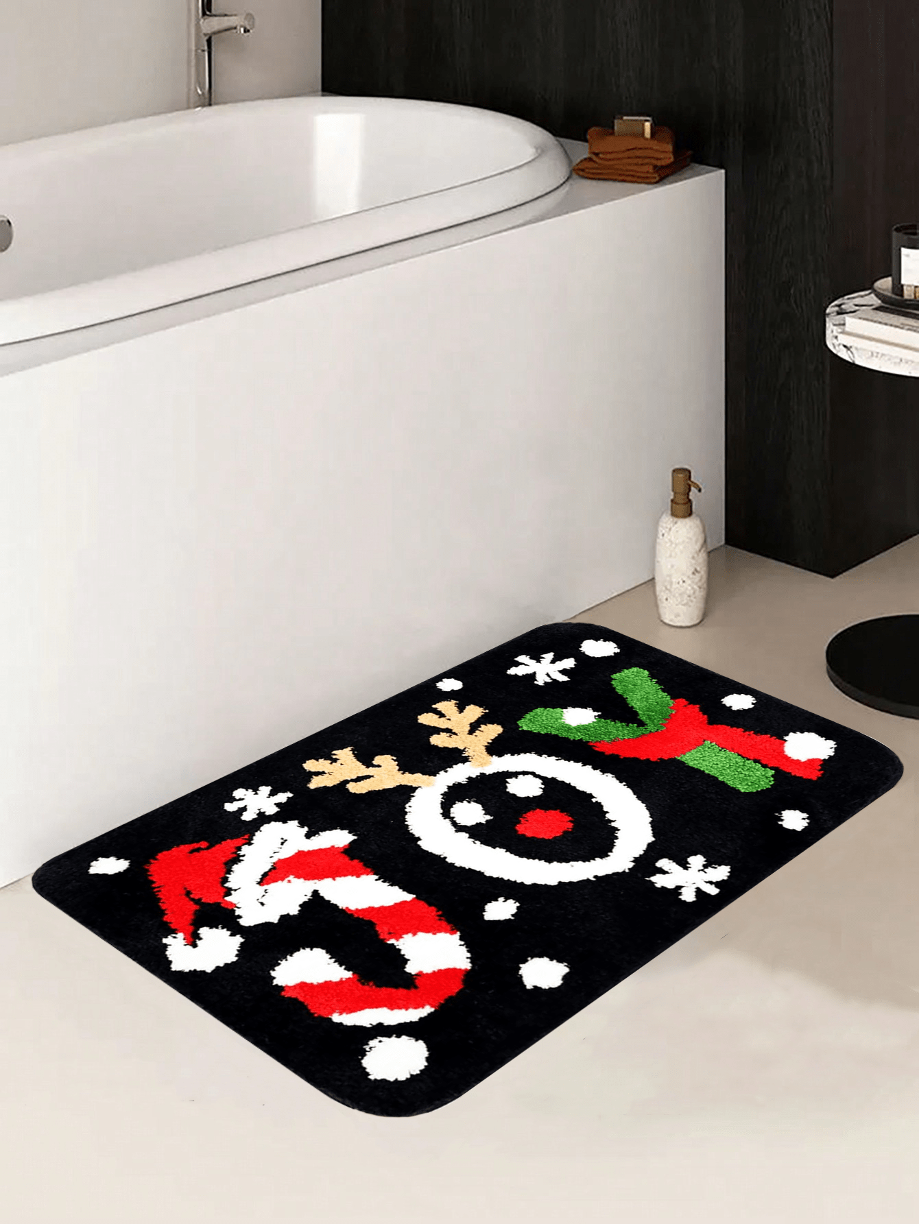 Introducing the Festive Holiday Cheer Bath Mat! This microfiber mat features a fun Santa hat and candy cane design, while also providing softness, absorbency, and non-slip support. Keep your bathroom festive and clean with this washable bath mat.
