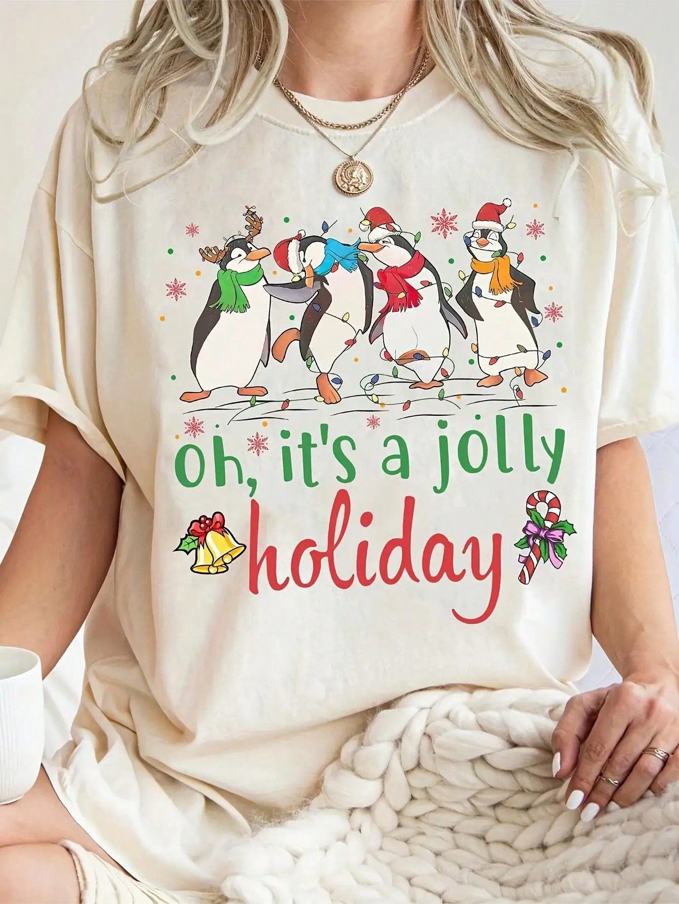 Waddle into the holiday spirit with this charming penguin print tee that brings festive cheer year-round. Featuring an adorable penguin design perfect for Christmas celebrations, this women's t-shirt combines comfort with personality. The classic crew neck and soft fabric make it ideal for casual everyday wear, whether you're spreading seasonal joy or just embracing your love for these lovable arctic birds. Cozy, cute, and endlessly versatile—your new favorite wardrobe staple awaits.