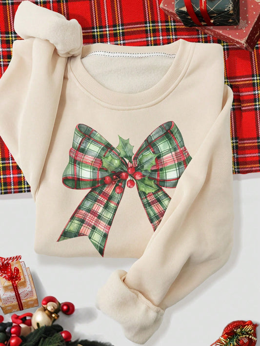 This festive plaid bow print crew neck sweatshirt is the perfect addition to your Christmas wardrobe. Made with a comfortable fit, it features a stylish bow print that adds a touch of elegance to any outfit. Get into the holiday spirit with this must-have sweatshirt.