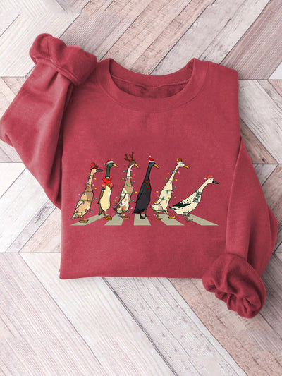 Get ready to "quack" up with our festive and fun sweatshirt! The Festive Quackers sweatshirt features a quirky and cheerful Christmas duck design that is sure to spread holiday cheer. Made with comfortable material, it's perfect for any holiday gathering or cozy night in. Don't miss out on adding this unique and playful piece to your Christmas wardrobe!