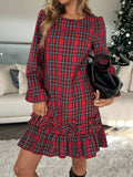 Celebrate the season in style with this charming red plaid mini dress that brings festive flair to your wardrobe. The whimsical lantern sleeves add a romantic touch, while the delicate floral ruffle hem creates an enchanting finishing detail. Perfect for holiday parties, seasonal gatherings, or whenever you want to embrace cheerful elegance. This playful piece combines classic plaid patterns with modern silhouette details for a look that's both timeless and trendy. Whether you're dancing at a winter celebra