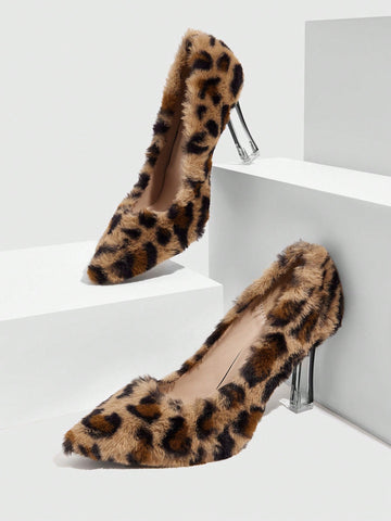 Add some sass to your step with our Fierce Elegance high heels. Featuring a bold leopard print and sparkling crystal accents, these pointed toe heels are perfect for making a statement. Strut your stuff with style and confidence.