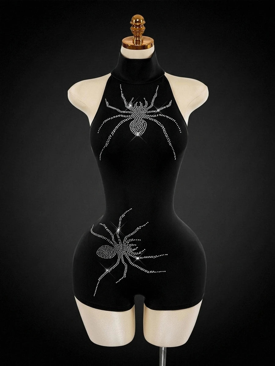 Front view of black halter unitard with rhinestone spider motifs