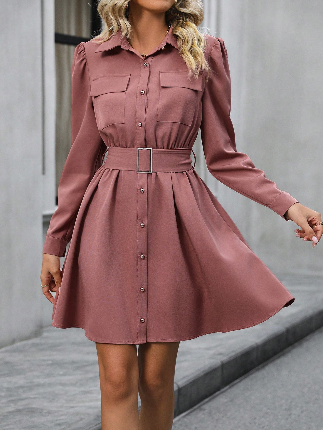 This Flap Pocket Puff Sleeve Shirt Dress with Belt offers the perfect blend of style and comfort. With its unique design, it features flap pockets, puff sleeves, and a belt for added sophistication. Made for all-day wear, this dress is perfect for any occasion.
