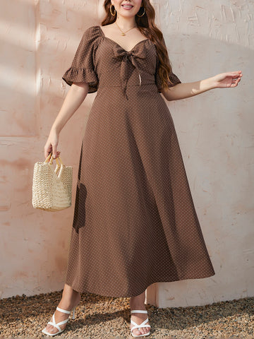 Embrace your curves in this playful polka dot A-line dress! The flounce sleeves add a flirty touch while the knot front detail creates a flattering silhouette. Perfect for summer brunches or evening strolls, this plus-size stunner lets you look fabulous without trying too hard. Just slip it on and you're ready to turn heads!