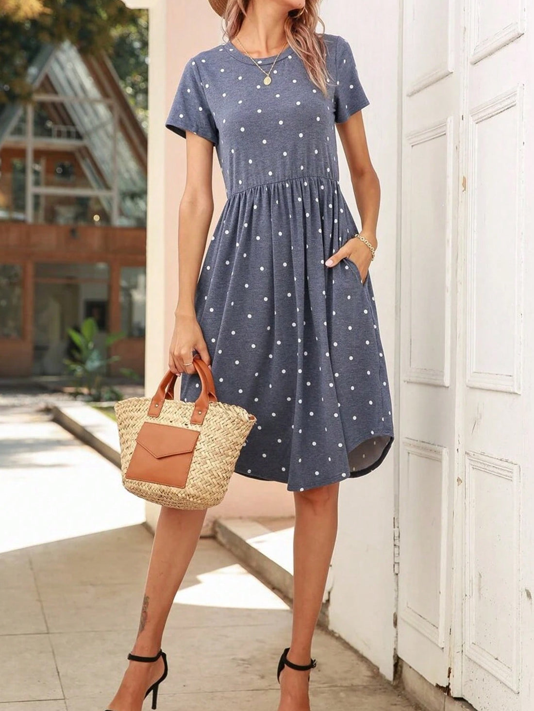 This playful tunic dress is the perfect addition to your summer wardrobe! With flirty blue polka dots, ruffles, and pockets, it's both stylish and functional. Stay cool and trendy in this must-have dress!