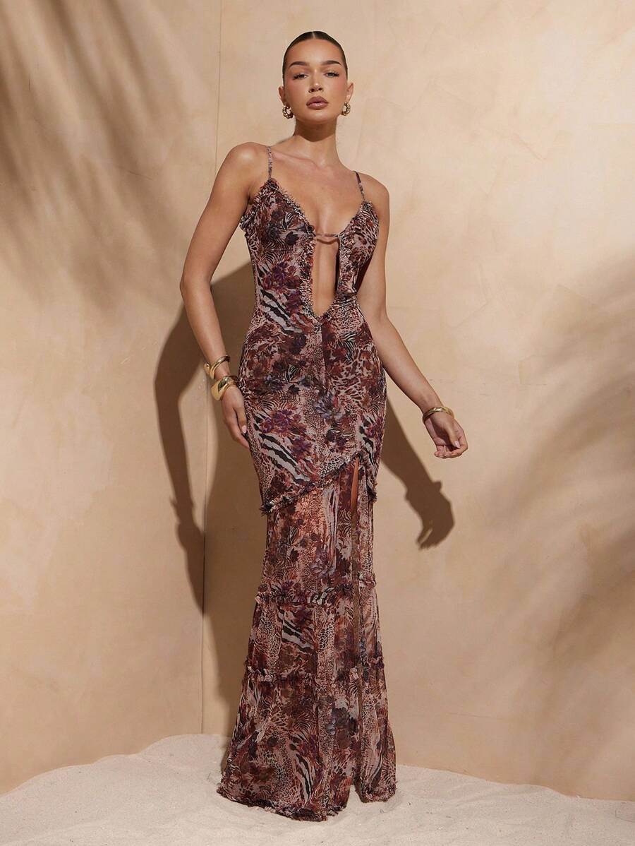 Step into paradise with this Floral & Animal Print Ruffle Maxi Dress, your ultimate getaway companion. Its vibrant mix of prints and playful ruffles bring island vibes to life, making it perfect for sun-soaked vacations or romantic honeymoons. Lightweight and breezy, it keeps you cool while turning heads wherever you go. Embrace effortless style and let your adventurous spirit shine!