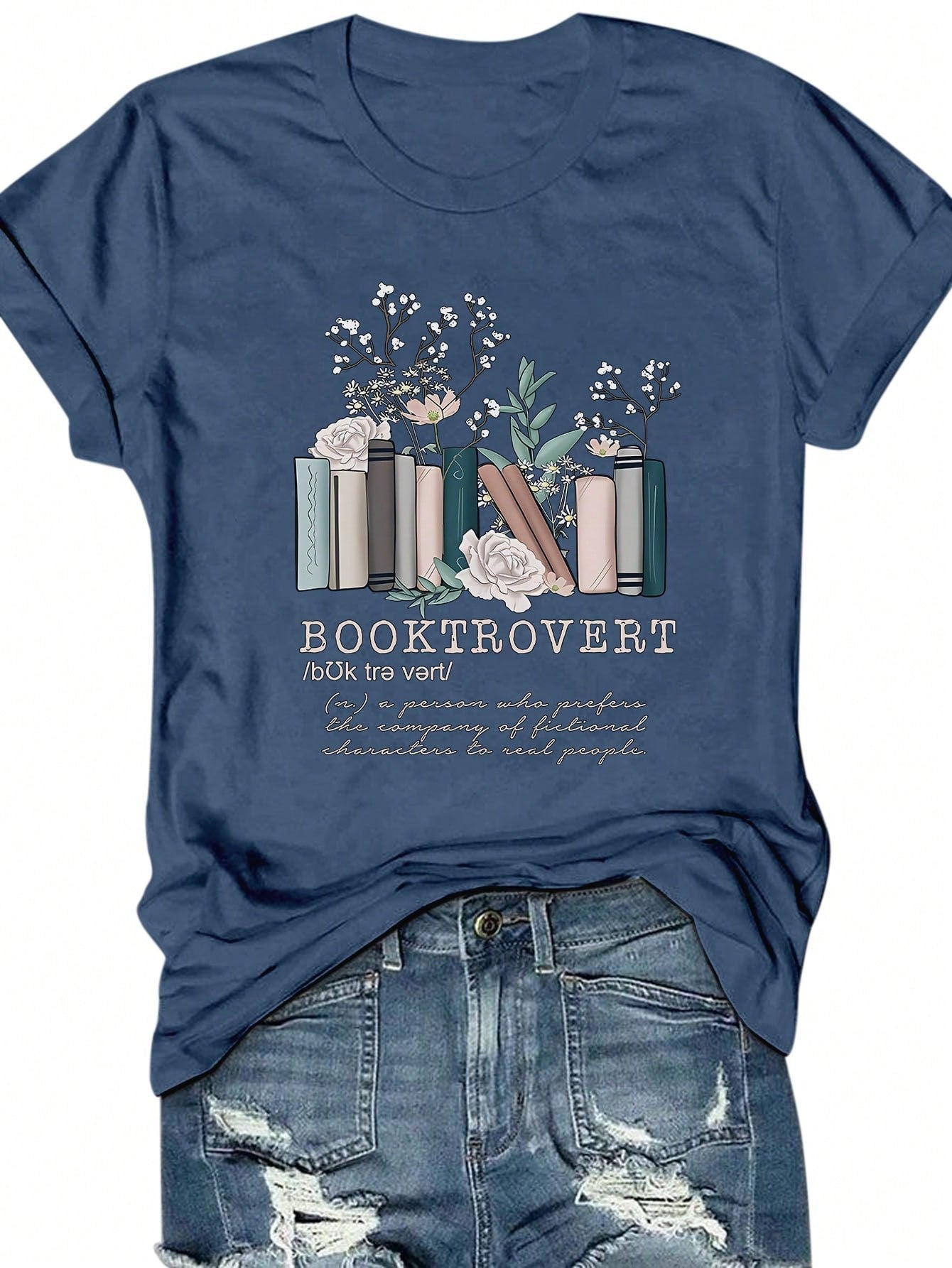 Add some bookish charm to your wardrobe with our Floral Book Print T-Shirt! Featuring a colorful book print on a soft, casual tee, this shirt is perfect for any book lover. The short sleeves make it perfect for warmer weather while the graphics add a touch of whimsy. (Bookworms unite!)