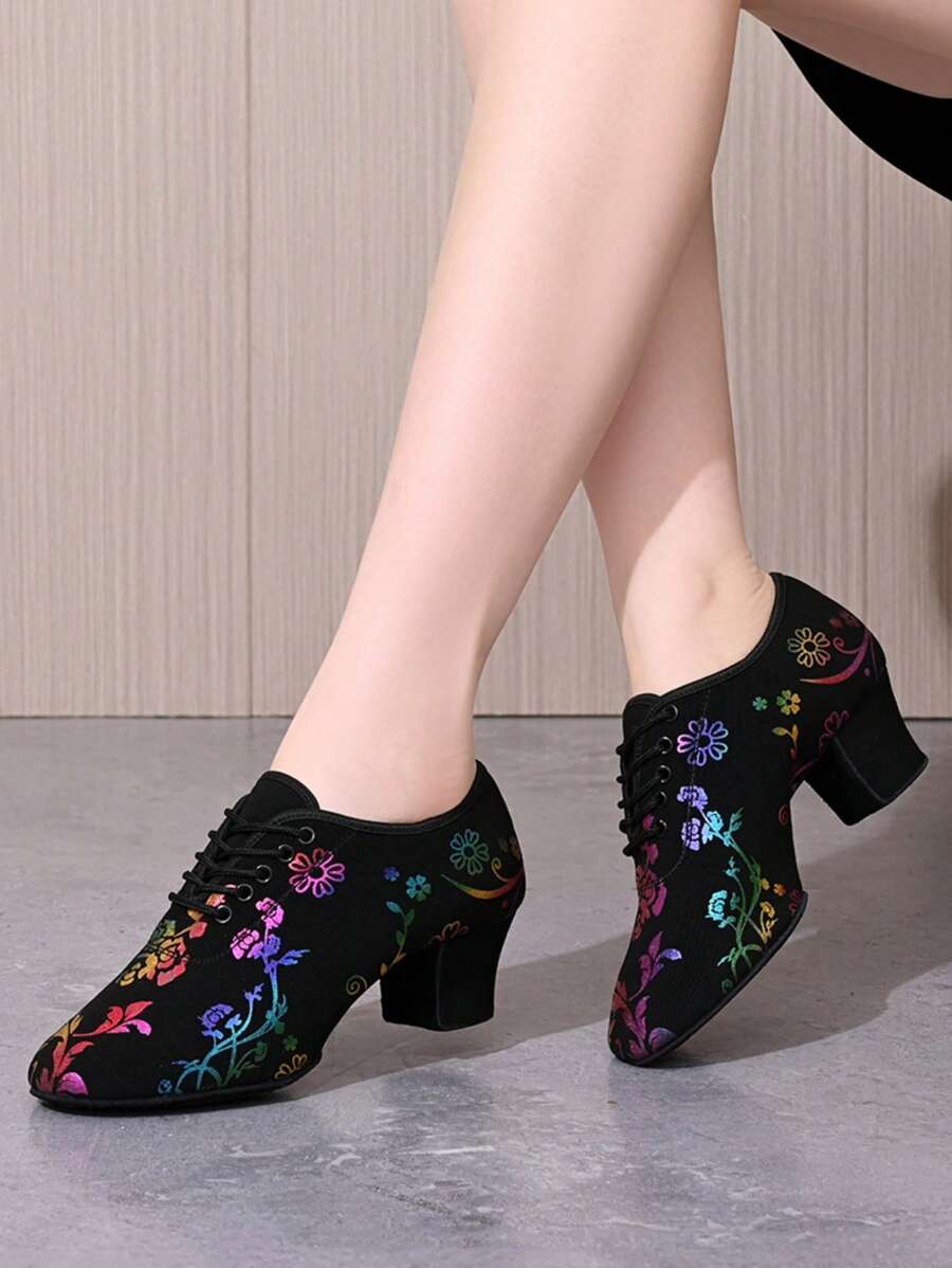 Elevate your dance performance with these versatile floral canvas dance shoes designed for women. Featuring a chunky heel for stability and support, these lace-up shoes blend style with functionality across multiple dance genres—from jazz and salsa to ballroom, hip-hop, and Latin styles. The durable canvas upper and mesh lining provide breathability and comfort during extended wear, while the EVA outsole delivers reliable grip and flexibility. The floral detailing adds a feminine touch to your dance wardrob