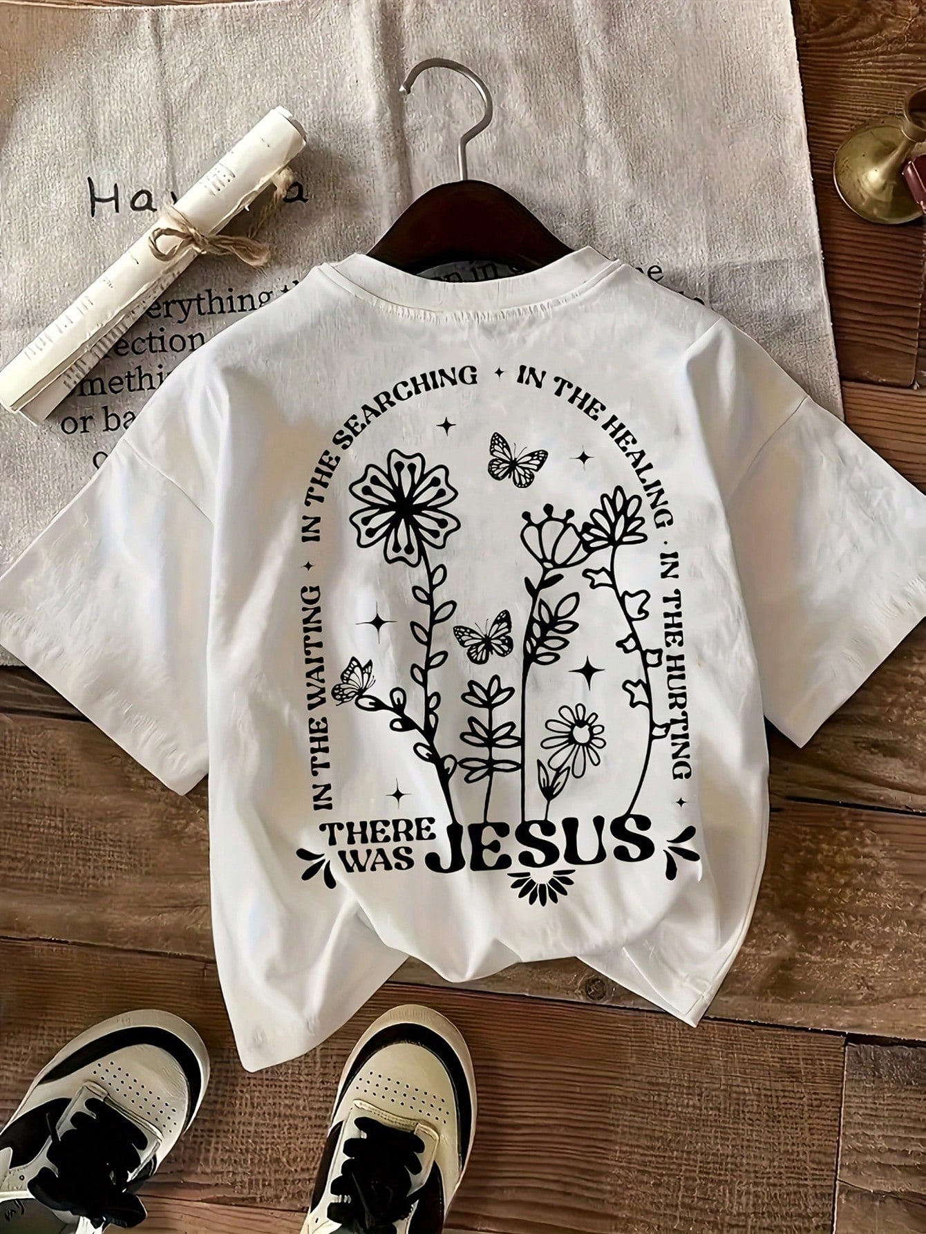 Experience effortless style with Floral Charm. This women's t-shirt features a comfortable round neck and a charming floral design. Perfect for daily wear, it effortlessly adds a touch of feminine flair to any outfit. Crafted with quality materials, it offers both comfort and style.