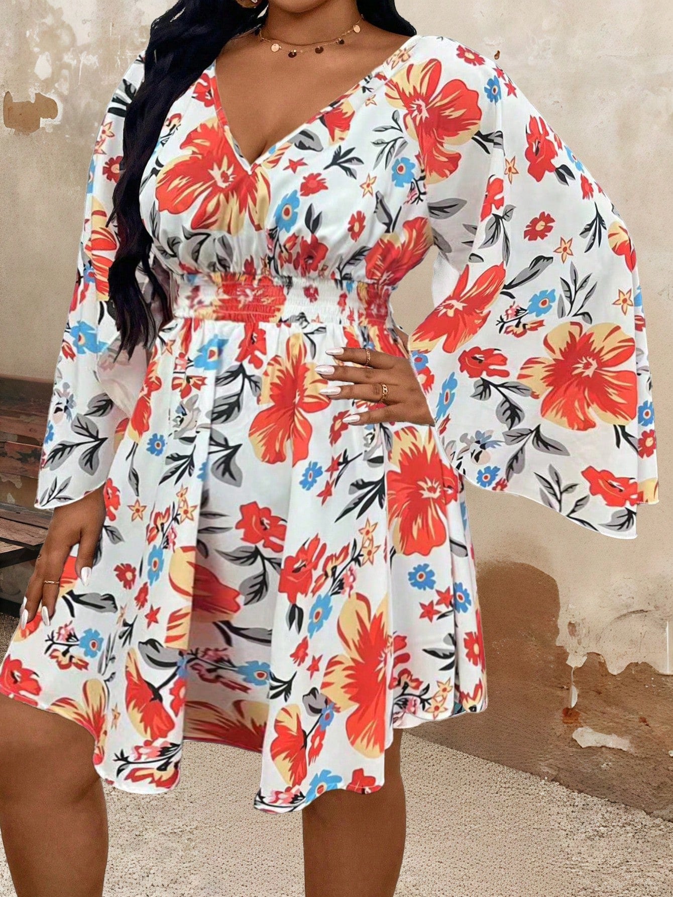 Floral Elegance: Plus Size Women’s Deep V-Neck Flare Sleeve Dress offers a flattering fit and flared sleeves for a stylish look. Made with high-quality materials, it provides comfort and sophistication. Perfect for any occasion, this dress is a must-have addition to any wardrobe.