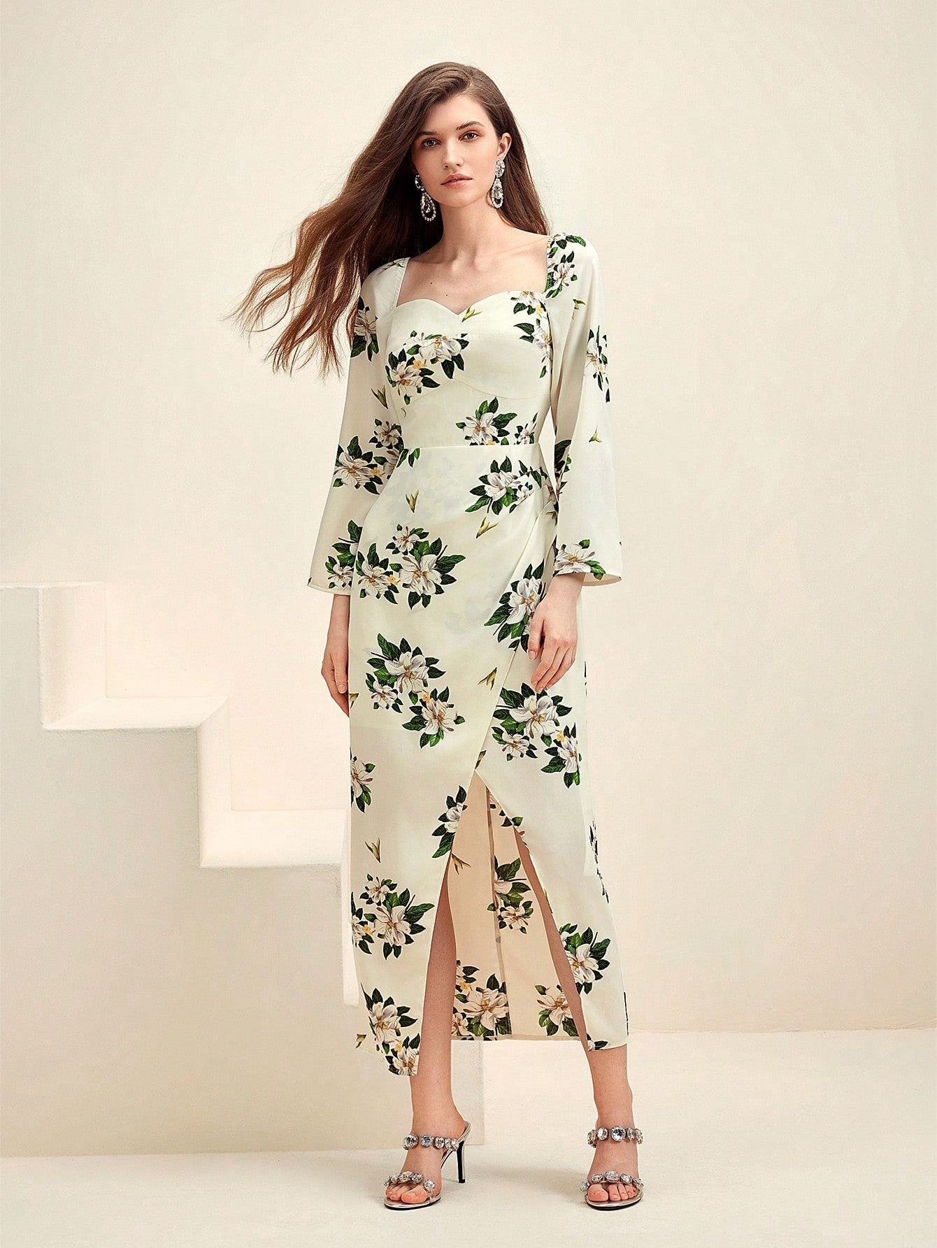 Flaunt effortless elegance in this Floral Elegance dress. The sweetheart neck and wrap-front design create a flattering silhouette, while the chic split detail adds a touch of intrigue. Perfect for any occasion, this dress combines style and comfort in one.