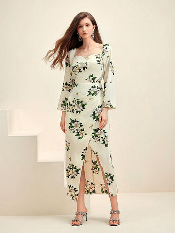 Flaunt effortless elegance in this Floral Elegance dress. The sweetheart neck and wrap-front design create a flattering silhouette, while the chic split detail adds a touch of intrigue. Perfect for any occasion, this dress combines style and comfort in one.