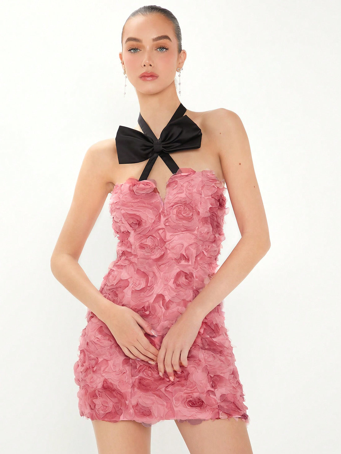 Stay stylish and quirky with our Floral Embroidered Color Block Halter Neck Dress. Featuring beautiful floral embroidery, color block design, and a playful bowknot detail. Perfect for adding a pop of fun to any outfit! (Bow down to this fabulous dress!)