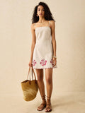 Say hello to the perfect dress for those sunny beach getaways! Our Floral Embroidered Minimalist Spaghetti Strap Short Dress is equal parts stylish and comfortable. With delicate floral embroidery and adjustable straps, you'll be turning heads while staying cool. Beach, please!