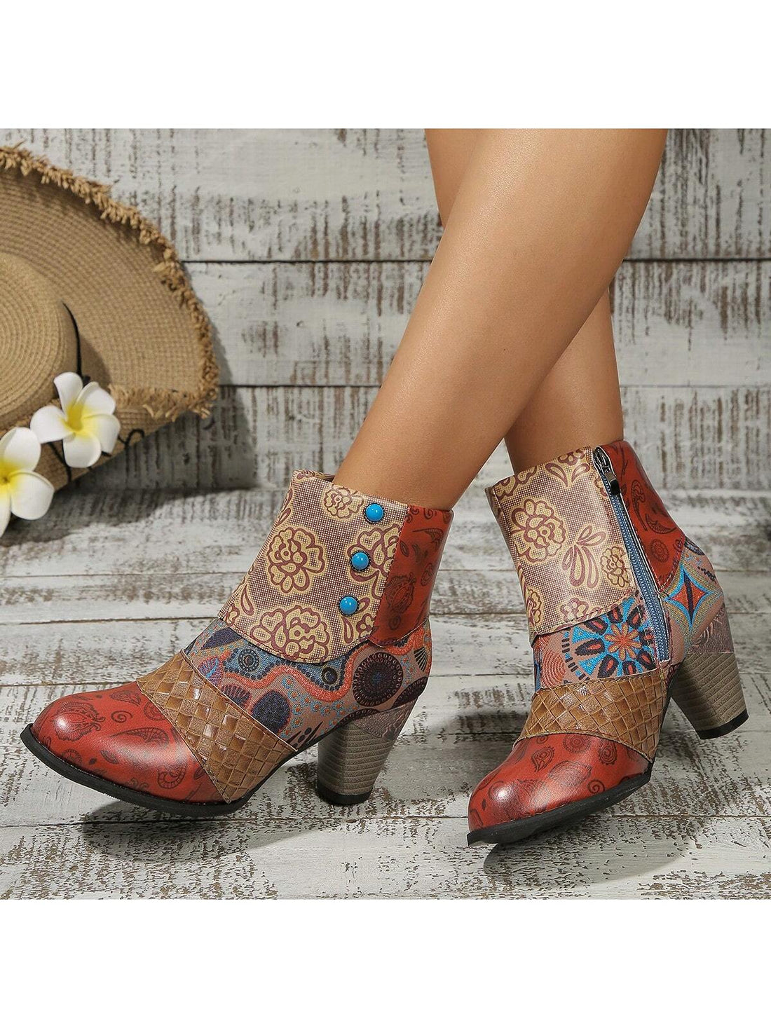 Elevate your style with Floral Finesse: Chic Multicolor Ankle Boots, designed for trendy women. These boots feature a sophisticated floral pattern that adds a touch of finesse to any outfit. With their sleek design and comfortable fit, these boots are perfect for any occasion. Step out in style and stand out from the crowd with Floral Finesse.