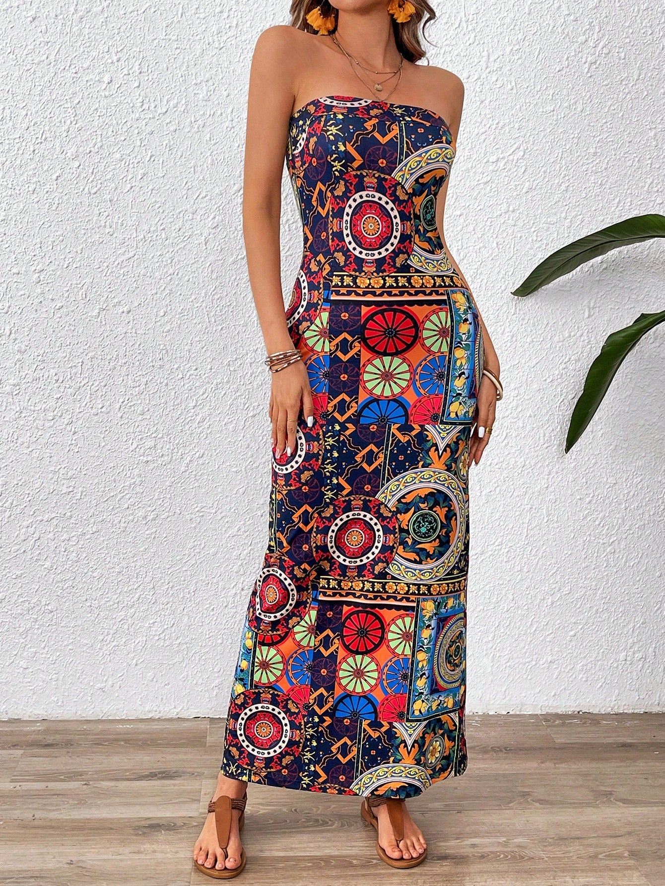 Experience a tropical paradise in our Floral Paradise: Vacation Women's Bandeau Maxi Bodycon Dress. Featuring a stunning floral print and a bodycon fit, this dress is perfect for any vacation or summer getaway. Made with high-quality materials, it offers both style and comfort for a truly unforgettable experience.