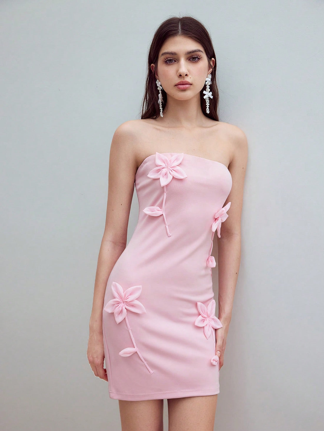 Step into summer with the Floral Patched Tube Dress, a playful maxi that blends elegance with effortless charm. Its vibrant floral patches add a splash of fun, while the tube design keeps things cool and comfy. Perfect for sunny days and breezy evenings, this dress lets you shine with minimal effort and maximum style.