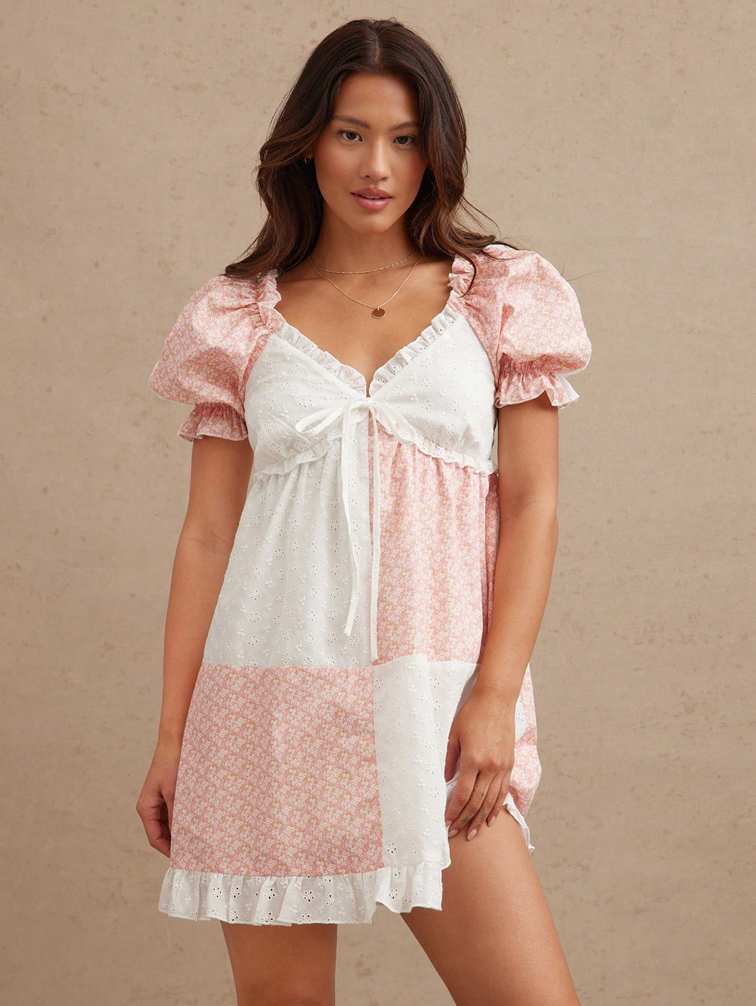 Step into summer with this Floral Patchwork Babydoll Dress, featuring charming ruffled puff sleeves that add a flirty touch. Its breezy silhouette keeps you cool and comfortable, while the vibrant patchwork print brings a playful, chic vibe to any sunny day adventure. Perfect for picnics, strolls, or casual outings, this dress makes effortless style your new go-to.